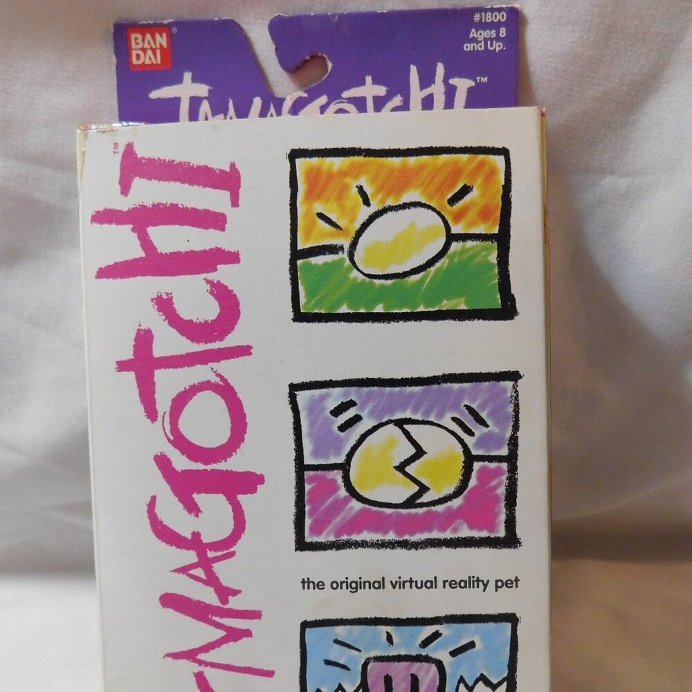 Bandai TAMAGOTCHI Electronic Virtual Reality Pet 1997 Purple